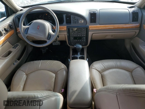 1999 Lincoln Continental с VIN 1LNHM97V8XY671775, выставлен на аукционе Copart как лот 42429965 с пробегом 79 851 миль миль и Чистый • Clean title. История ставок и продаж доступна на DreamBid. Изображение 8.