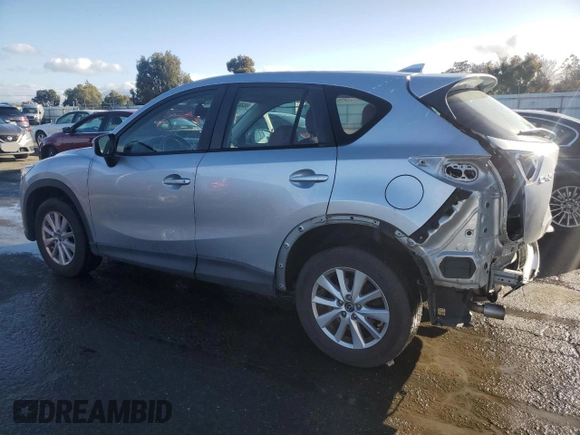 2016 Mazda CX-5 Sport with VIN JM3KE2BEXG0904597, listed as a Copart auction lot 86293834 with 63,343 mi miles and Salvage Title. Bid and sale history available at carsss.com. Image 2.