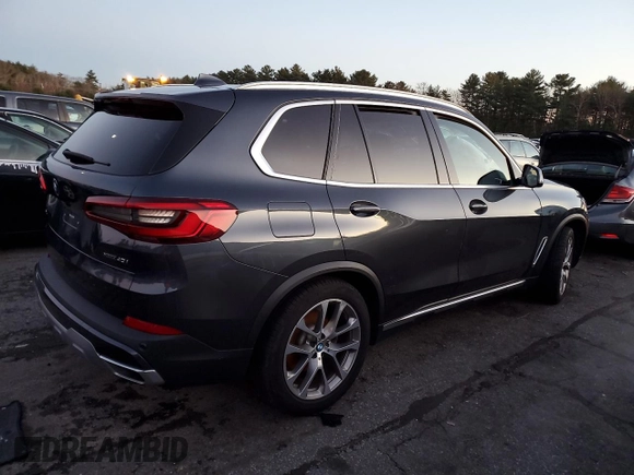 2021 BMW X5 sDrive40i with VIN 5UXCR4C03M9E13698, listed as a Copart auction lot 84158714 with 0 mi miles and Salvage Title. Bid and sale history available at carsss.com. Image 3.