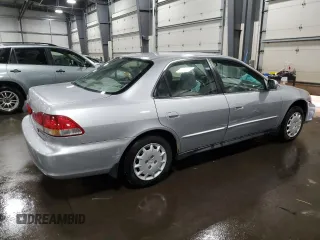 2001 Honda Accord LX z VIN JHMCG55401C011175, wystawiony jako Copart lot #88027405 z przebiegiem 143 973 mil mil oraz Szkoda całkowita • Salvage title. Historia ofert i sprzedaży dostępna na DreamBid. Obrazek 3.