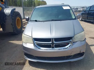2014 Dodge Grand Caravan SXT z VIN 2C4RDGCG3ER128971, wystawiony jako IAAI lot #41921386 z przebiegiem 255 074 mil mil oraz . Historia ofert i sprzedaży dostępna na DreamBid. Obrazek 6.