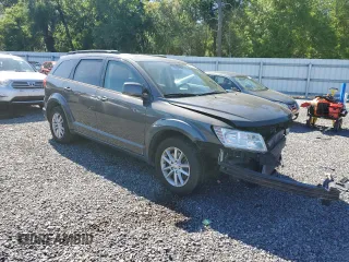 2014 Dodge Journey SXT with VIN 3C4PDCBG4ET211324, listed as a Copart auction lot 53255785 with 187,126 mi miles and Salvage Title. Bid and sale history available at carsss.com. Image 4.