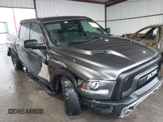 2017 Ram 1500 Rebel z VIN 1C6RR7YT0HS593919, wystawiony jako IAAI lot #41450337 z przebiegiem 164 024 mil mil oraz . Historia ofert i sprzedaży dostępna na DreamBid. Obrazek 1.