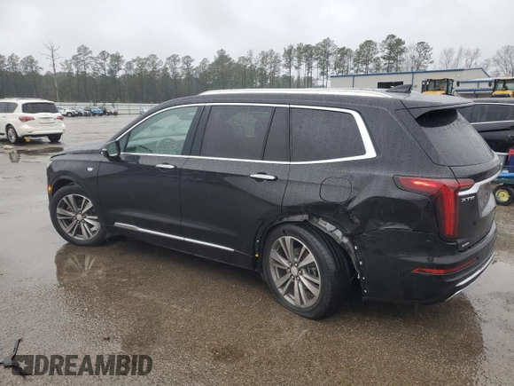 2021 Cadillac XT6 Premium Luxury z VIN 1GYKPDRS3MZ117552, wystawiony jako Copart lot #46487165 z przebiegiem 50 349 mil mil oraz Tytuł czysty. Historia ofert i sprzedaży dostępna na DreamBid. Obrazek 2.