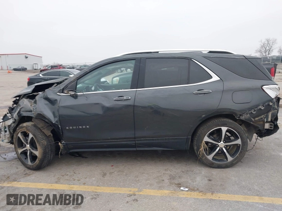 2021 Chevrolet Equinox Premier z VIN 2GNAXXEV2M6118116, wystawiony jako IAAI lot #41185151 z przebiegiem 91 837 mil mil oraz . Historia ofert i sprzedaży dostępna na DreamBid. Obrazek 14.
