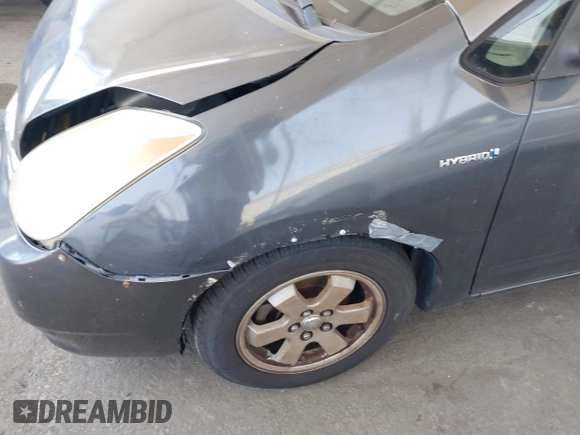 2007 Toyota Prius z VIN JTDKB20UX73281542, wystawiony jako IAAI lot #42449989 z przebiegiem 164 111 mil mil oraz . Historia ofert i sprzedaży dostępna na DreamBid. Obrazek 13.