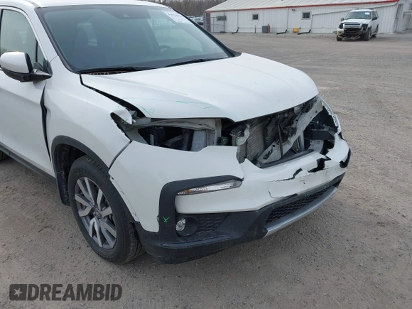 2022 Honda Pilot EX-L с VIN 5FNYF6H56NB098884, выставлен на аукционе IAAI как лот 41924421 с пробегом 68 868 миль миль и . История ставок и продаж доступна на DreamBid. Изображение 6.