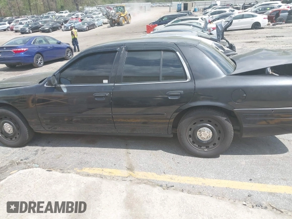2004 Ford Police Interceptor Base w/3.27 Axle with VIN 2FAFP71W34X136279, listed as a IAAI auction lot 41945086 with 151,350 mi miles and . Bid and sale history available at DreamBid. Image 14.