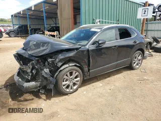 2023 Mazda CX-30 S Premium with VIN 3MVDMBDMXPM527113, listed as a Copart auction lot 57169165 with 49,040 mi miles and Salvage title. Bid and sale history available at DreamBid. Image 1.