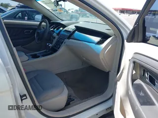 2011 Ford Taurus SE with VIN 1FAHP2DW1BG165371, listed as a IAAI auction lot 42164608 with 186,485 mi miles. Bid and sale history available at carsss.com. Image 5.