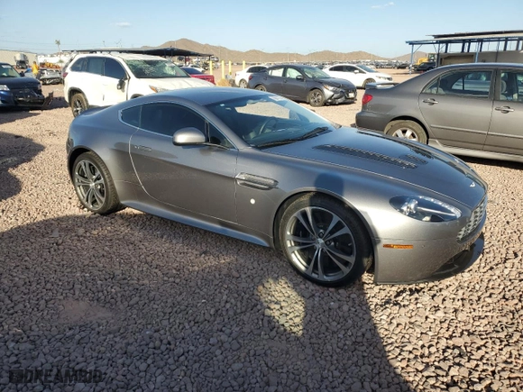 2011 Aston Martin V12 Vantage Carbon Black with VIN SCFEBBCF4BGS00791, listed as a Copart auction lot 76911374 with 8,207 mi miles and Salvage Title. Bid and sale history available at carsss.com. Image 4.
