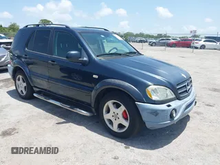 2001 Mercedes-Benz M AMG with VIN 4JGAB74E51A237992, listed as a IAAI auction lot 42445427 with 222,759 mi miles and . Bid and sale history available at DreamBid. Image 1.