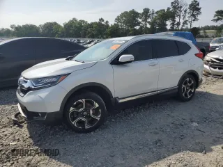 2019 Honda CR-V Touring with VIN 2HKRW1H98KH500220, listed as a Copart auction lot 58670695 with 76,228 mi miles and Salvage title. Bid and sale history available at DreamBid. Image 1.