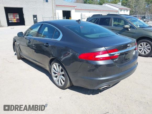2014 Jaguar XF V6 SC with VIN SAJWJ0EF9E8U31032, listed as a IAAI auction lot 42046036 with 118,927 mi miles. Bid and sale history available at carsss.com. Image 3.