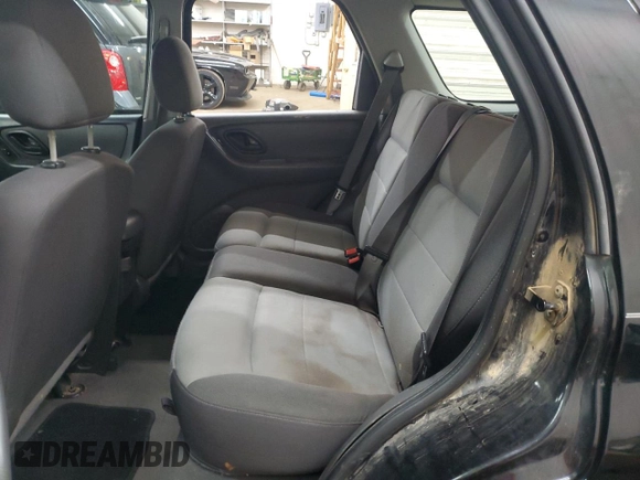 2005 Ford Escape XLS Value with VIN 1FMYU92Z05DA10448, listed as a Copart auction lot 54438955 with 185,303 mi miles and Salvage title. Bid and sale history available at DreamBid. Image 11.