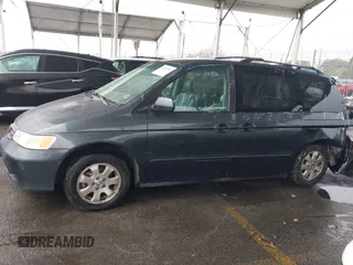 2004 Honda Odyssey EX-L with VIN 5FNRL18974B015769, listed as a IAAI auction lot 41533063 with 284,923 mi miles and . Bid and sale history available at DreamBid. Image 14.