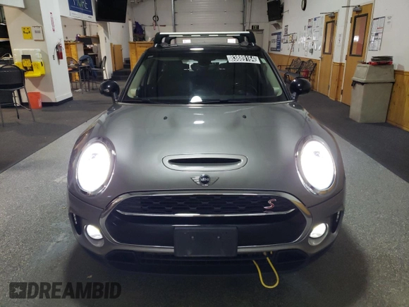 2017 MINI Clubman Cooper S with VIN WMWLU5C57H2E82150, listed as a Copart auction lot 83889164 with 82,854 mi miles and Clean Title. Bid and sale history available at carsss.com. Image 5.