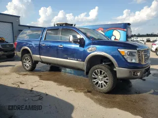 2017 Nissan Titan XD SV with VIN 1N6BA1F4XHN564059, listed as a Copart auction lot 73087834 with 112,320 mi miles and Salvage Title. Bid and sale history available at carsss.com. Image 4.