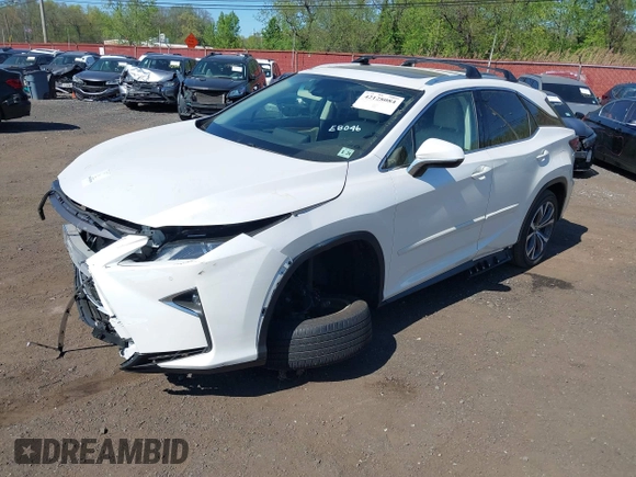 2019 Lexus RX 350 with VIN JTJBZMCA0K2041419, listed as a IAAI auction lot 42128084 with 98,994 mi miles and . Bid and sale history available at DreamBid. Image 18.