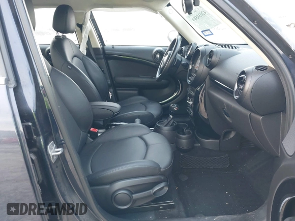 2013 MINI Countryman S with VIN WMWZC3C59DWP24390, listed as a IAAI auction lot 42038509 with 134,903 mi miles and . Bid and sale history available at DreamBid. Image 5.