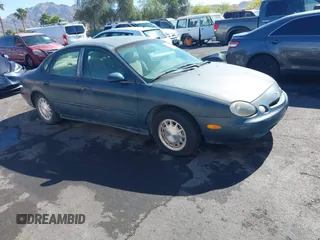 1996 Ford Taurus LX with VIN 1FALP53S0TG125665, listed as a IAAI auction lot 42290691 with 91,152 mi miles and . Bid and sale history available at DreamBid. Image 1.