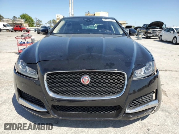 2016 Jaguar XF 35t Prestige with VIN SAJBE4BV5GCY03875, listed as a Copart auction lot 52793135 with 54,202 mi miles and Salvage Title. Bid and sale history available at carsss.com. Image 5.