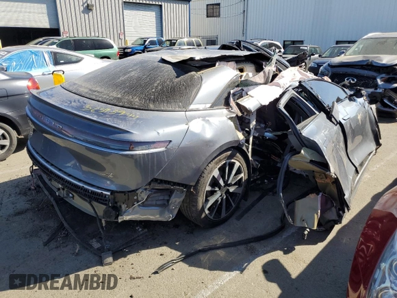 2023 Lucid Air Pure z VIN 50EA1PFA6PA006296, wystawiony jako Copart lot #52593944 z przebiegiem Nie podano mil oraz Szkody całkowita. Historia ofert i sprzedaży dostępna na DreamBid. Obrazek 3.