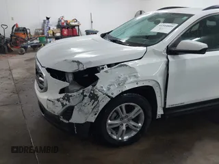 2021 GMC Terrain SLE with VIN 3GKALTEV0ML383940, listed as a IAAI auction lot 41544809 with 50,858 mi miles and . Bid and sale history available at carsss.com. Image 6.