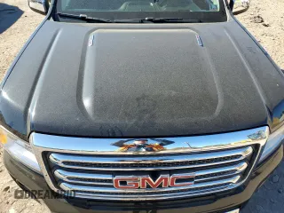 2016 GMC Canyon 4WD SLT with VIN 1GTP6DE11G1357147, listed as a Copart auction lot 77835344 with 106,890 mi miles and Salvage Title. Bid and sale history available at carsss.com. Image 12.