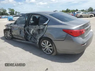 2015 Infiniti Q50 with VIN JN1BV7AP9FM332795, listed as a Copart auction lot 63416925 with 106,986 mi miles and Salvage title. Bid and sale history available at DreamBid. Image 2.