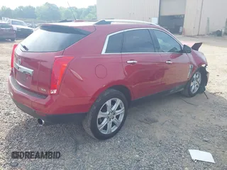 2015 Cadillac SRX Performance Collection z VIN 3GYFNCE37FS567267, wystawiony jako IAAI lot #42160129 z przebiegiem 144 948 mil mil oraz . Historia ofert i sprzedaży dostępna na DreamBid. Obrazek 4.