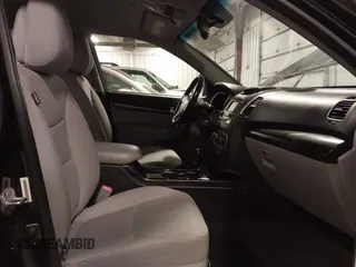 2015 Kia Sorento LX with VIN 5XYKTCA66FG573928, listed as a IAAI auction lot 42017586 with 174,939 mi miles. Bid and sale history available at carsss.com. Image 5.