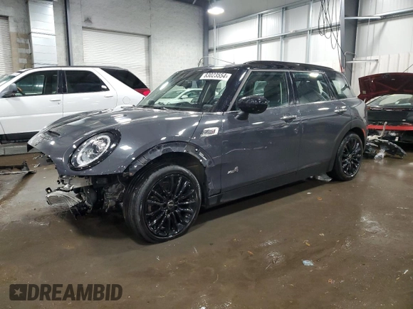 2021 MINI Clubman Cooper S with VIN WMWXJ1C05M2P49901, listed as a Copart auction lot 83023554 with 49,357 mi miles and Salvage Title. Bid and sale history available at carsss.com. Image 1.