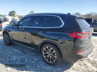 2023 BMW X5 sDrive40i with VIN 5UXCR4C06P9P01409, listed as a Copart auction lot 43127395 with 27,564 mi miles and Salvage Title. Bid and sale history available at carsss.com. Image 2.