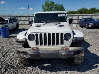 2023 Jeep Gladiator Rubicon with VIN 1C6JJTBG9PL546437, listed as a Copart auction lot 55516685 with 14,106 mi miles and Salvage title. Bid and sale history available at DreamBid. Image 5.