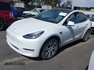 2021 Tesla Model Y Long Range with VIN 5YJYGDEE3MF081304, listed as a IAAI auction lot 41706240 with 90,510 mi miles and . Bid and sale history available at DreamBid. Image 19.