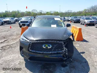 2019 Infiniti QX50 LUXE with VIN 3PCAJ5M31KF128562, listed as a IAAI auction lot 41965402 with 61,664 mi miles. Bid and sale history available at carsss.com. Image 13.