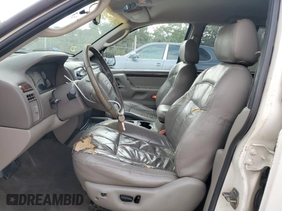 2002 Jeep Grand Cherokee Limited with VIN 1J4GX58S72C139972, listed as a Copart auction lot 47767395 with 163,395 mi miles and Salvage Title. Bid and sale history available at DreamBid. Image 7.