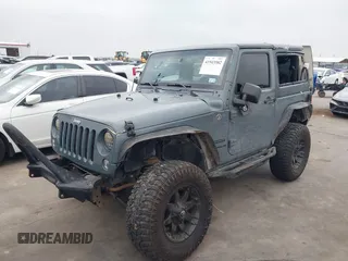 2015 Jeep Wrangler Sport with VIN 1C4GJWAG7FL585631, listed as a IAAI auction lot 41943582 with 88,649 mi miles and . Bid and sale history available at DreamBid. Image 17.