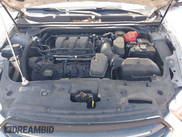 2013 Ford Taurus SEL with VIN 1FAHP2E81DG129229, listed as a IAAI auction lot 41999326 with 205,856 mi miles. Bid and sale history available at carsss.com. Image 10.