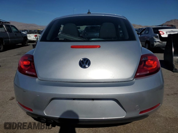 2014 Volkswagen Beetle Entry с VIN 3VWF17AT6EM642555, выставлен на аукционе Copart как лот 46953805 с пробегом 95 153 миль миль и Списание • Salvage title. История ставок и продаж доступна на DreamBid. Изображение 6.
