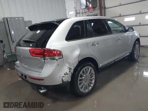 2014 Lincoln MKX with VIN 2LMDJ8JK7EBL16661, listed as a IAAI auction lot 41595967 with 77,868 mi miles. Bid and sale history available at carsss.com. Image 4.