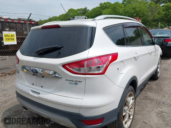2016 Ford Escape Titanium with VIN 1FMCU9J92GUA71444, listed as a IAAI auction lot 42334603 with 79,780 mi miles and . Bid and sale history available at DreamBid. Image 4.