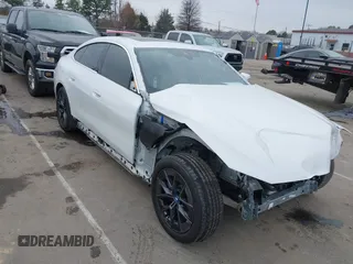 2023 BMW i4 eDrive35 z VIN WBY43AW04PFP70309, wystawiony jako IAAI lot #41745911 z przebiegiem 15 453 mil mil oraz . Historia ofert i sprzedaży dostępna na DreamBid. Obrazek 1.