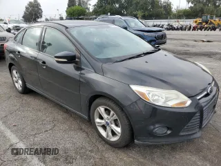 2013 Ford Focus SE z VIN 1FADP3F20DL335132, wystawiony jako Copart lot #61042315 z przebiegiem 149 443 mil mil oraz Czysty tytuł • Clean title. Historia ofert i sprzedaży dostępna na DreamBid. Obrazek 4.