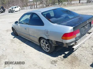 1998 Honda Civic DX with VIN 1HGEJ6123WL130983, listed as a IAAI auction lot 41836867 with 290,461 mi miles. Bid and sale history available at carsss.com. Image 3.