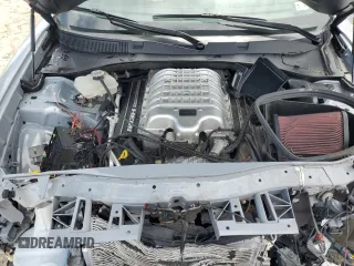 2021 Dodge Charger SRT Hellcat Widebody z VIN 2C3CDXL97MH603070, wystawiony jako Copart lot #57661925 z przebiegiem Nie podano mil oraz Szkoda całkowita • Salvage title. Historia ofert i sprzedaży dostępna na DreamBid. Obrazek 11.