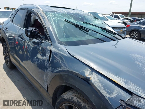 2022 Mazda CX-30 S Carbon Edition with VIN 3MVDMBCL6NM410330, listed as a IAAI auction lot 42107426 with 30,277 mi miles and . Bid and sale history available at DreamBid. Image 6.