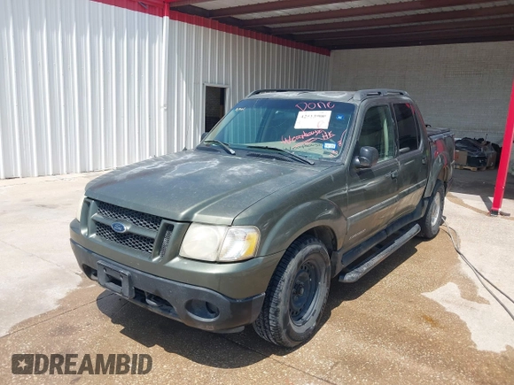 2001 Ford Explorer Sport Trac with VIN 1FMZU67E61UB92823, listed as a IAAI auction lot 42513900 with 186,525 mi miles and . Bid and sale history available at DreamBid. Image 2.