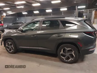 2022 Hyundai Tucson SEL Convenience with VIN KM8JFCA11NU080691, listed as a IAAI auction lot 42106350 with 81,477 mi miles and . Bid and sale history available at carsss.com. Image 15.